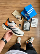 ADIZERO BOSTON 12 BRANCO LARANJA