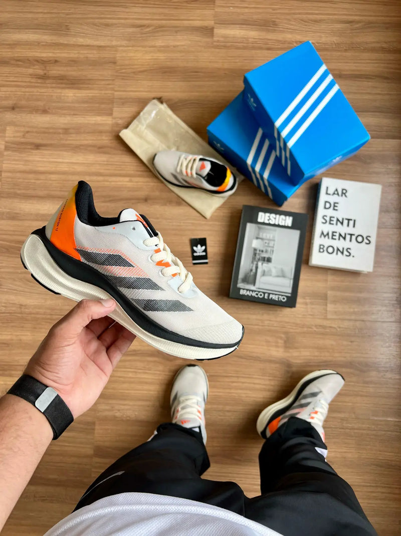 ADIZERO BOSTON 12 BRANCO LARANJA