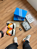 ADIZERO BOSTON 12 BRANCO LARANJA